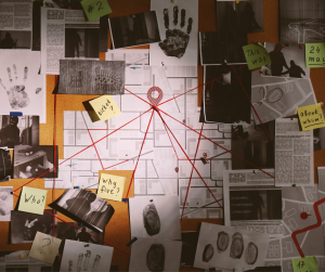 A cork board with pieces of evidence