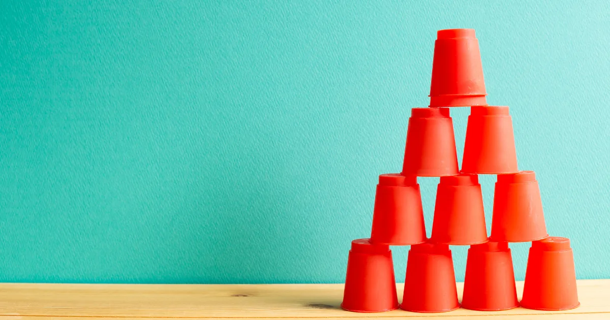 A pyramid of stacked plastic cups